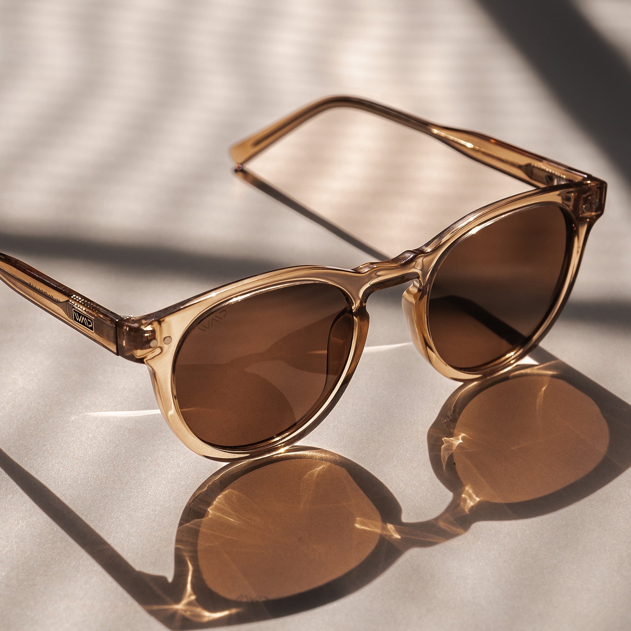 TATE Retro Round Unisex Sunglasses in Light Crystal Brown by WMP Eyewear